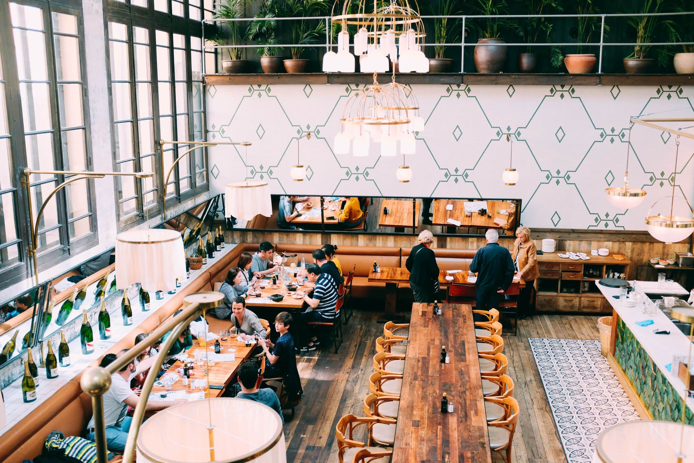 A restaurant dining room during evening service